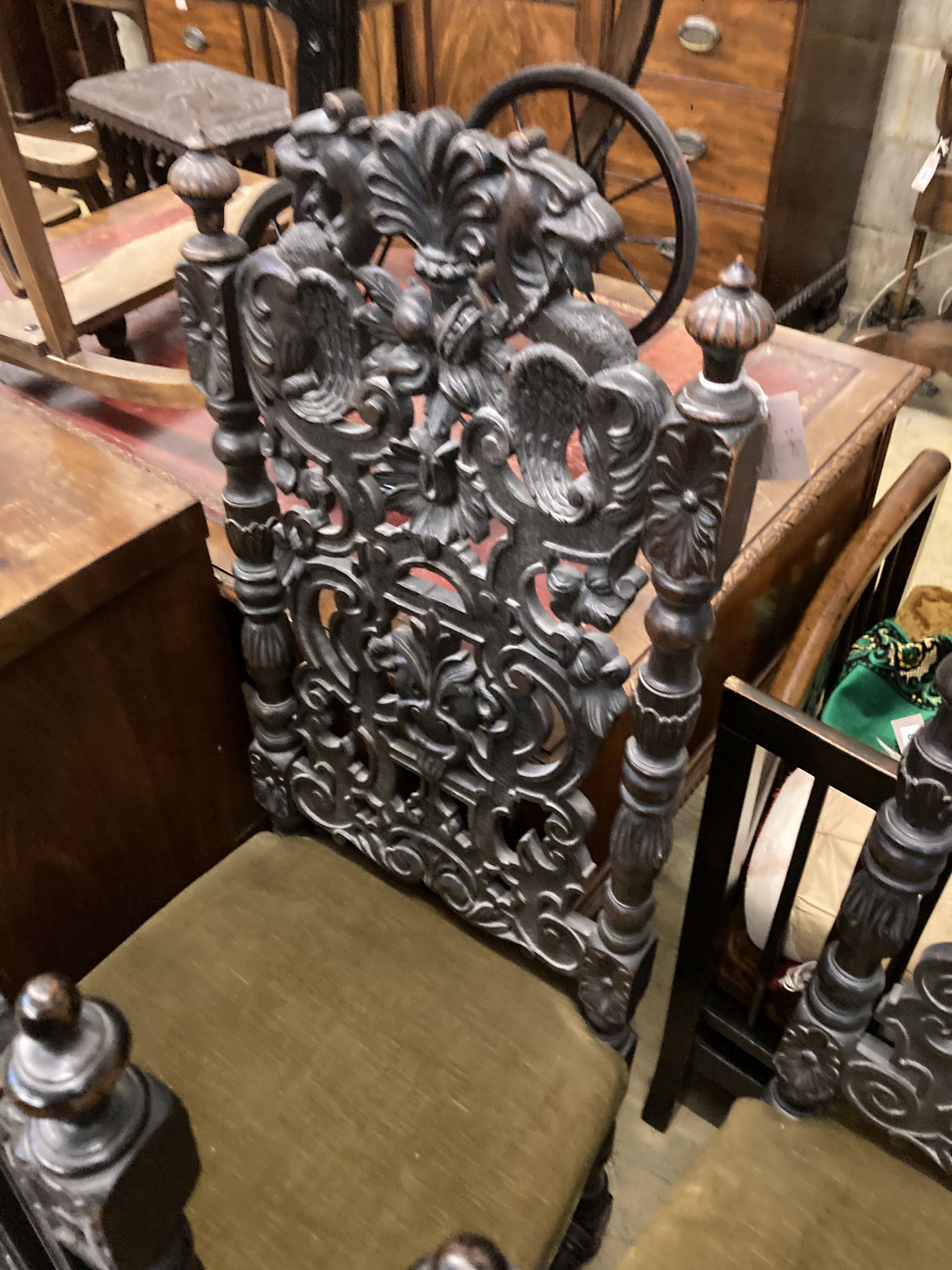 Two pairs of Victorian carved oak dining chairs